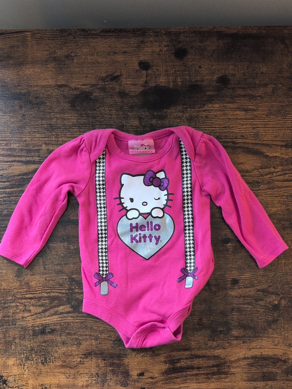 5/$25 Hello Kitty Bright Pink Long Sleeve Bodysuit with Heart Graphic